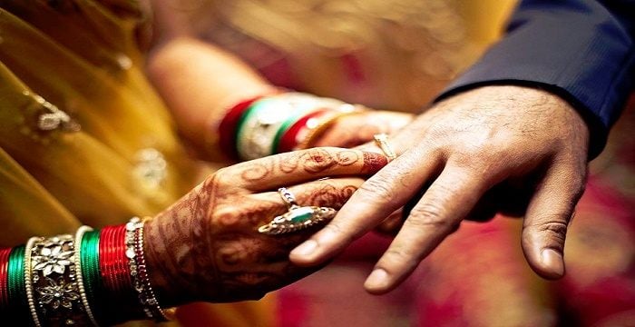 Ring ceremony in Hindu wedding Stock Photo - Alamy