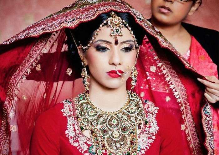Nose ring is one of the Solah shringars of a Hindu bride that also has health benefits.