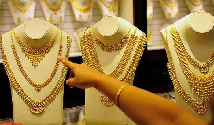 Indian woman loves and adores her gold